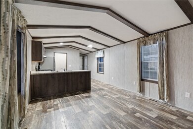 The living room to the kitchen view