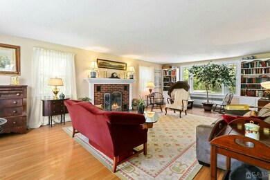 Built-in bookcases and a wood burning fireplace.