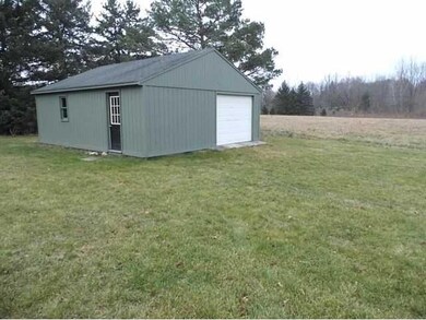 Exterior Back. 25  x 22  Outbuilding. Freshly pain