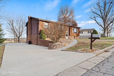 Front and Driveway to rear garage