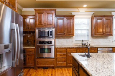 High CPM Oven Hood, 2 garbage disposal, custom cabinets, prep-sink