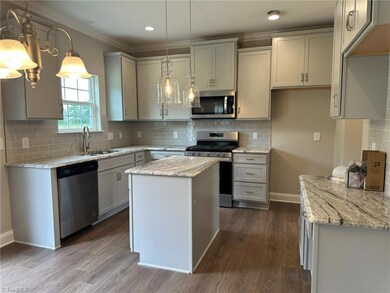 Tile backsplash & gorgeous pendants