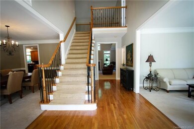 Foyer Entry front staircase, dual staircases