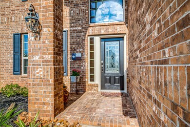 Welcome your family and friends through the leaded glass and wood door.
