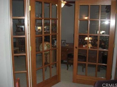 Beautiful solid wood French Doors connect Den/Offi