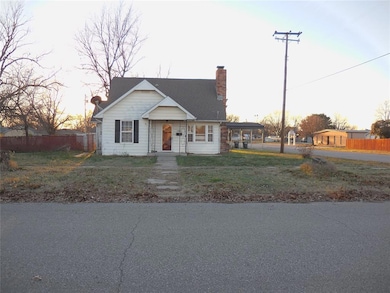 View of front of home with a carport