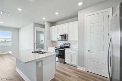Photos are of a model home with the same floorplan