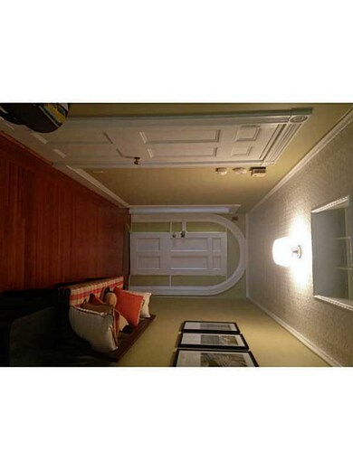 Entry. Formal entry with closet door to left