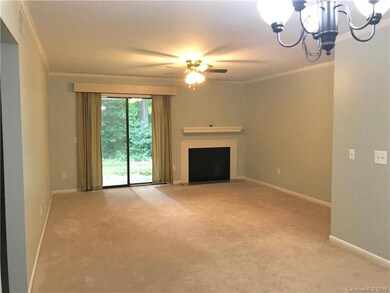 Open floorplan with newer carpet. Neutral walls he