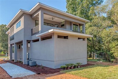 Rear House view with Master Terrace above outdoor 