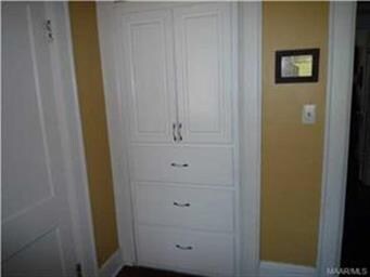 Built in storage in bedroom/office room