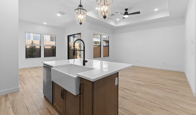 Kitchen with white apron-front sink