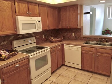 Kitchen w/ View Out to Great Room