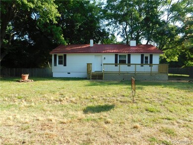 Front of house with new front porch.