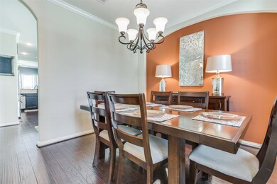 Another view of the formal dining.  This room also offers crown molding and a designer chandelier.