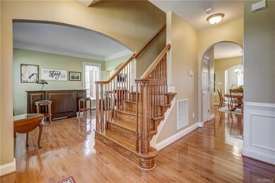 Notice the elegant curved archways in between room