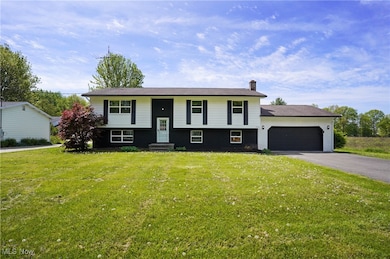 3740 Wilson Sharpsville Rd, Cortland, Ohio 44410 – Your dream home awaits! This stunning 5-bed, 3-bath single-family residence, completely renovated top-to-bottom, sits on a spacious 0.58-acre lot, blending luxury, functionality, and room to grow. Step into a bright, airy open-concept living space, perfect for modern living and effortless entertaining. The heart of the home is a gourmet kitchen featuring sleek Black Stainless Steel Samsung appliances, gorgeous Quartz Countertops, and an oversized island—ideal for meal prep, casual dining, or hosting. Enjoy abundant natural light through new windows and great installed lighting. Luxury LVT Shaw flooring flows seamlessly throughout, adding warmth and durability. Each of the three full bathrooms is beautifully updated with stylish finishes, offering a spa-like retreat.