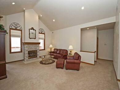 Great Room. Focal point gas fireplace in stone wit