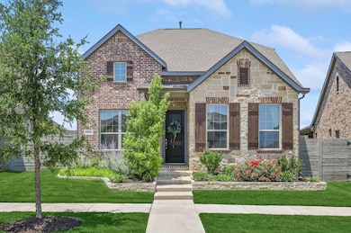 View of front of property featuring brick siding, 