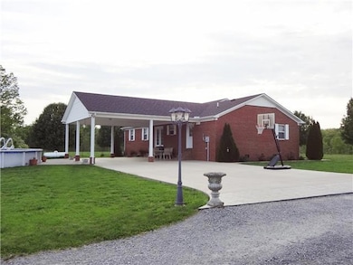 Notice the 28 x 28 (2 Car) Carport, and Concrete Driveway. The pool is now removed from the property, but it's a great place to put one down the road. 