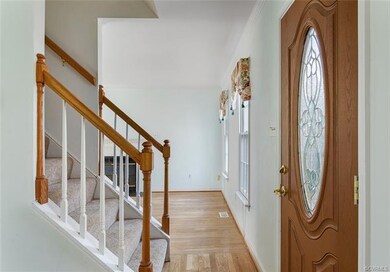 Foyer with hardwood
