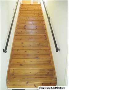 Stairway leading to contemporary studio apartment