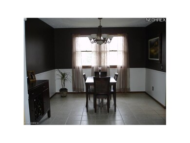 The spacious formal dining room will accomodate a 