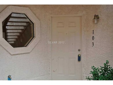Property Photo. Entrance to 103. Designer Window i