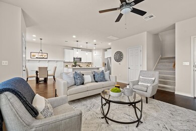 Living room featuring recessed lighting, dark woo