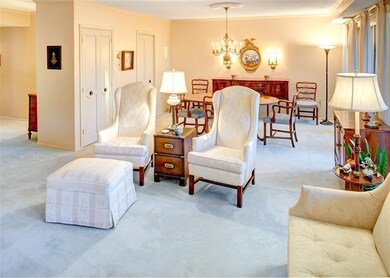 Living and dining rooms. The hallway is upper left