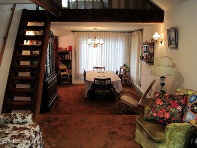 Great room with stairs to bonus room