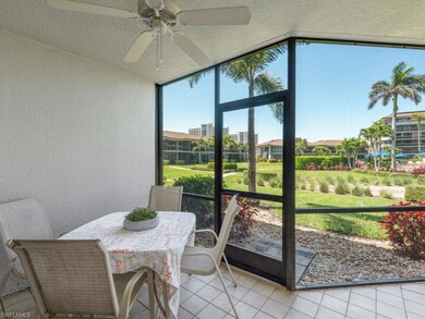 Sunroom with outdoor dining area and ceiling fan