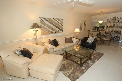 Living room featuring ceiling fan