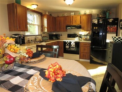 inside you will find a spacious eat-in kitchen whi