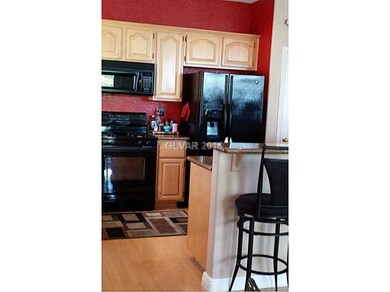 Property Photo. Kitchen with breakfast bar