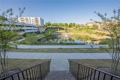 Surrounding community with a water view