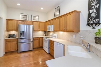 Warm and bright kitchen with tons of storage and c
