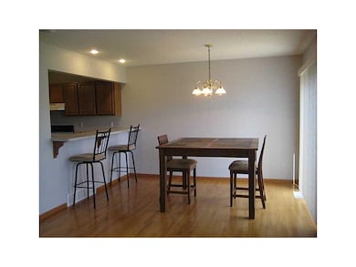 Dining Area. Solid Oak floors and slider to deck.