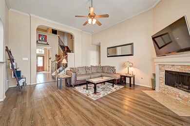 High ceilings and spacious family room open to the kitchen