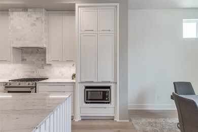 Note the stunning tile selected for the kitchen ba