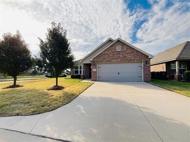 View of front of house with a garage and a front l