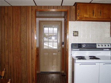Kitchen. Mud Room leads to garage/ back yard