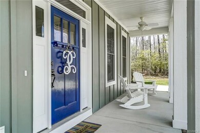 Inviting cobalt blue Craftsman-style front door.