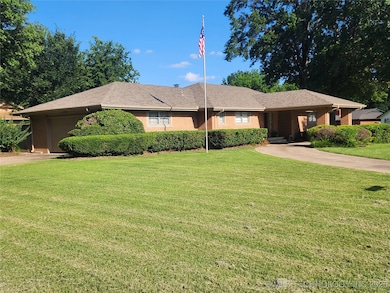 Front of home - left side showing porte cochere in