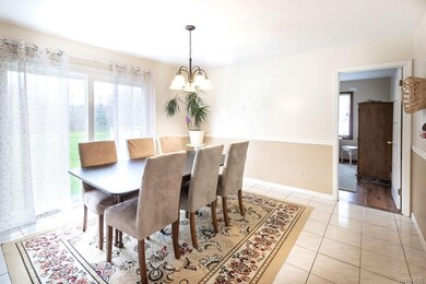 formal dinging room with sliding glass doors to ba