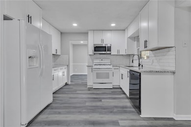 5618 Fern Creek Dr SW, Lilburn, GA 30047 - photo 6