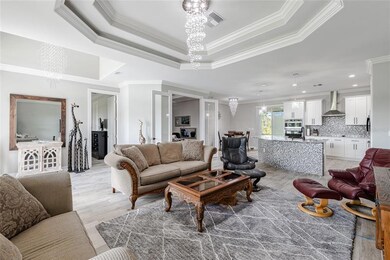 So much in one picture. From Left to right you will see the Foyer, Guest bedroom #2 entry, Bonus room with double doors, Dinette space, and dazzling Kitchen.