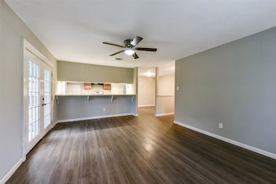 Living opens to kitchen