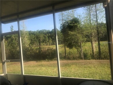 Screened lanai overlooking conservation