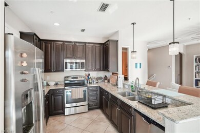Kitchen with appliances with stainless steel finis